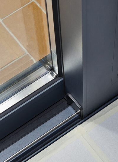 Sliding glass door detail and rail embed in floor
